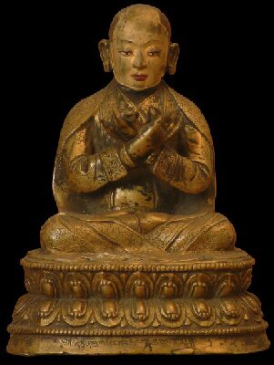 Undated, Tibet, gilt copper alloy with cold gold on face, at the Tibet House Museum in New Delhi.